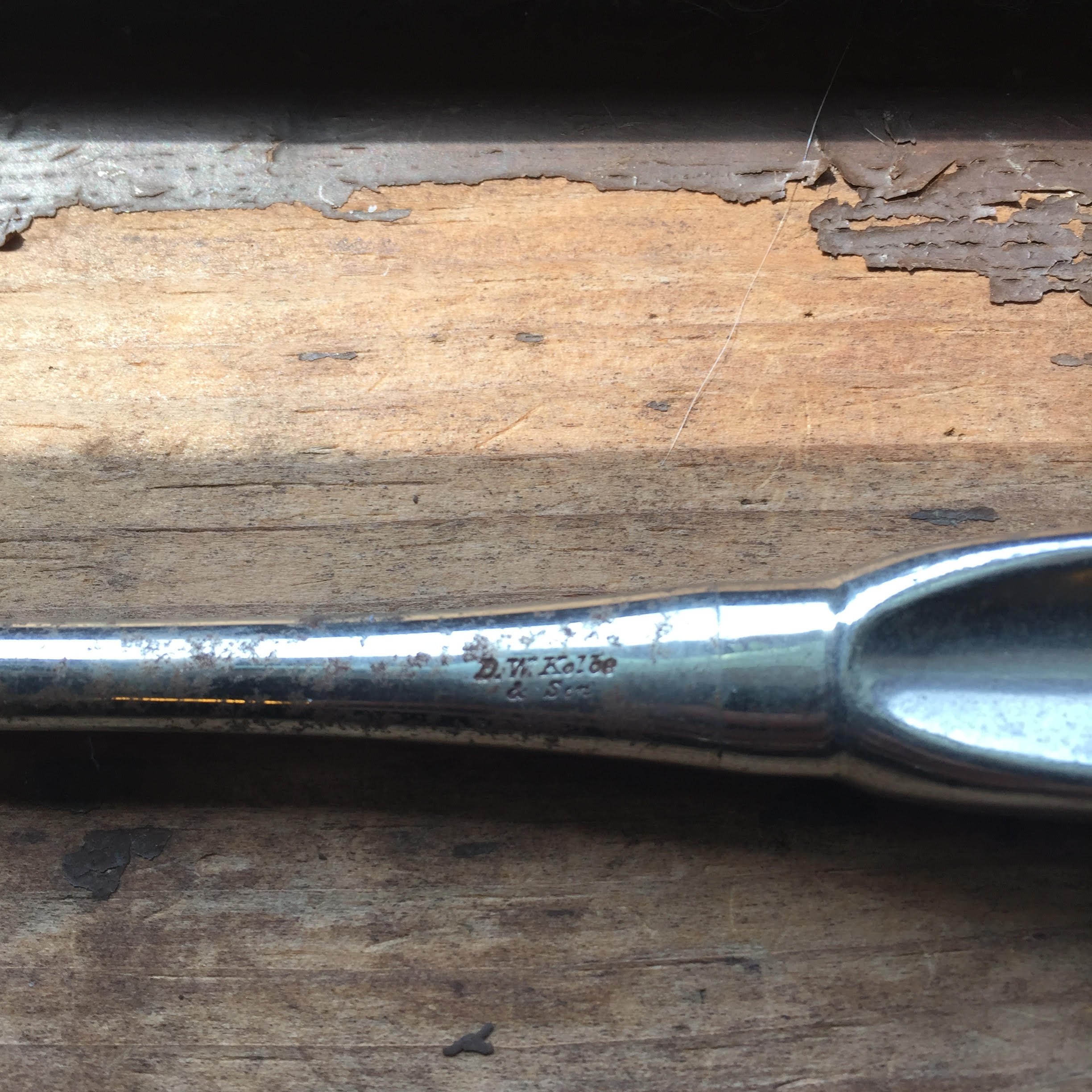 Maker's mark "D.W. Kolbe & Son" on an obstetrical blunt hook